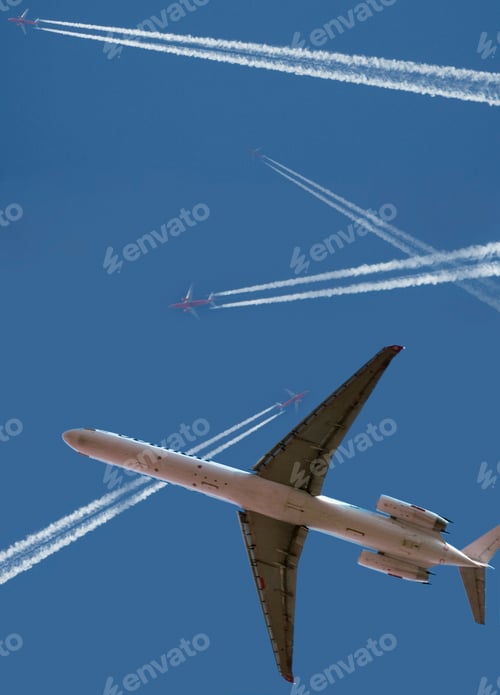 Preview: Jumbo Jet And Airplanes Flying Across Blue Sky