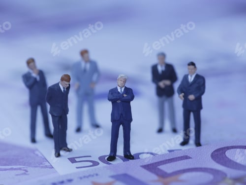 Preview: Figurines Of Businessmen Standing On Euros