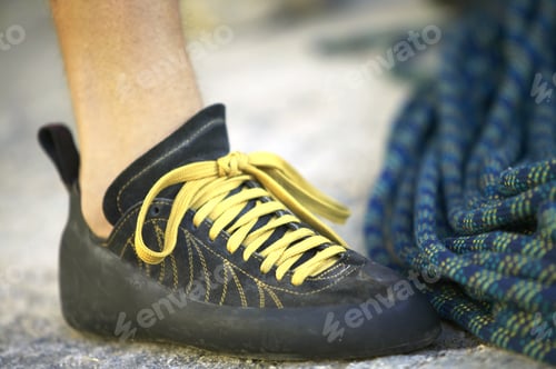 Preview: Detail View Of The Rock Climbing Shoe And Rope
