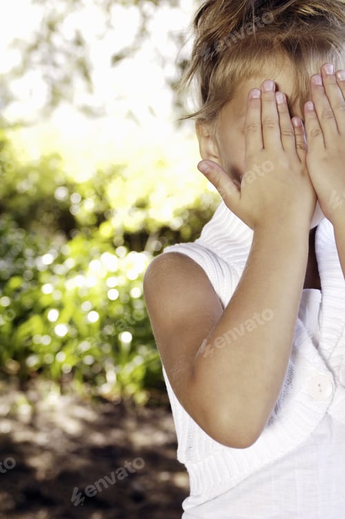 Preview: Young Girl With Hands Over Eyes