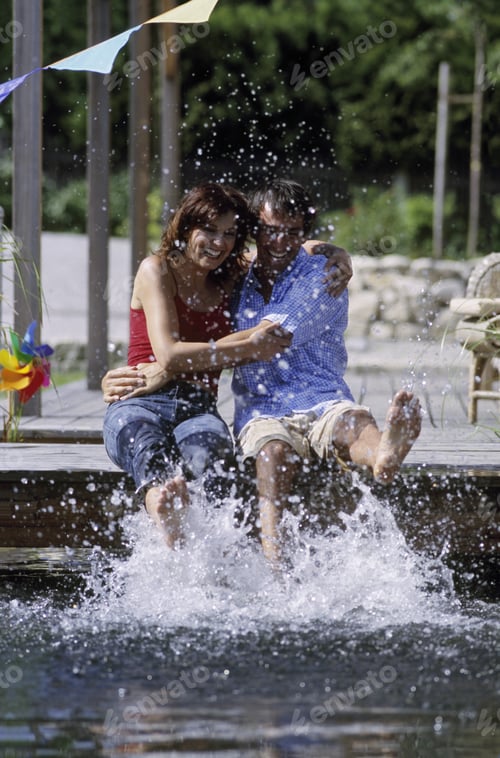 Preview: Man And Woman Splashing Water