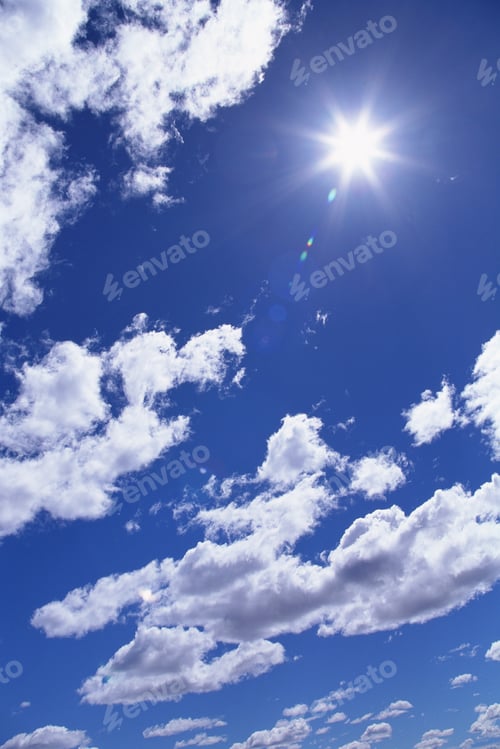 Preview: Low Angle View Of The Clouds, Sun And Blue Sky