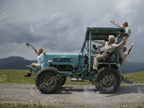 Preview: Friends Riding On Farm Vehicle, Kleinwalsertal, Allgau, Germany