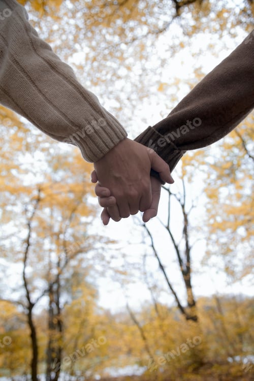 Preview: Close Up Of Couple Holding Hands