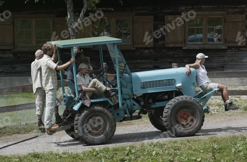 Preview: Friends Riding On Farm Vehicle, Kleinwalsertal, Allgau, Germany