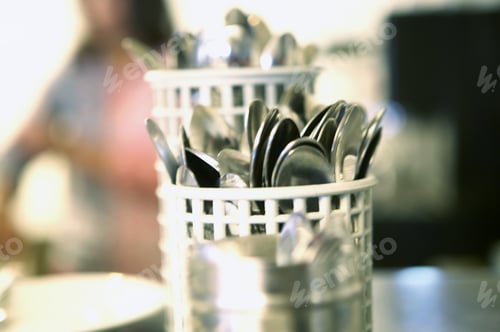 Preview: Detail View Of Silverware In A Basket