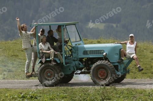 Preview: Friends Riding On Farm Vehicle, Kleinwalsertal, Allgau, Germany