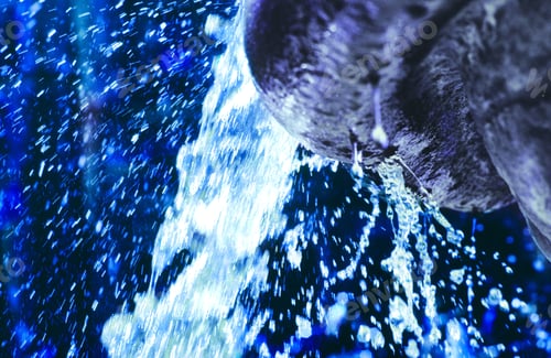 Preview: Abstract Image Of Water Flowing Out Of A Fountain
