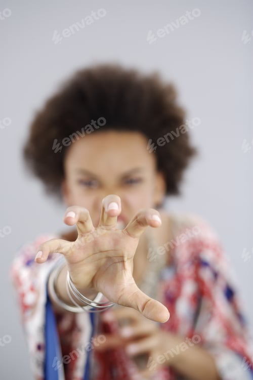 Preview: Teenage Girl Extending Claw Hand