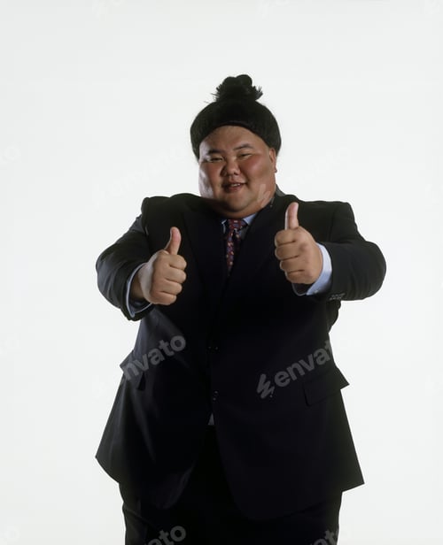 Preview: Portrait Of A Sumo Wrestler In A Business Suit Giving Two Thumbs Up