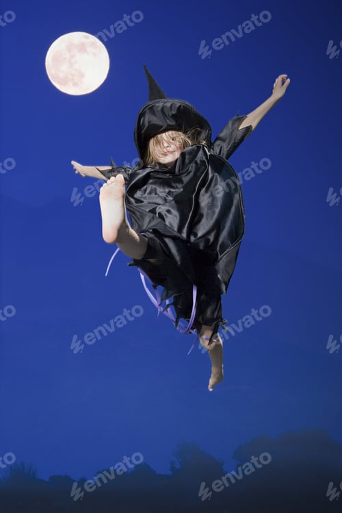 Preview: Girl In Witch Costume Jumping In Air