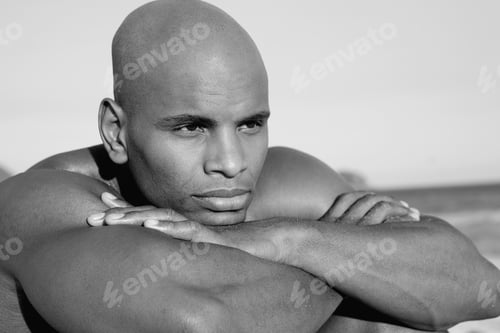 Preview: African Man Resting Chin In Arms