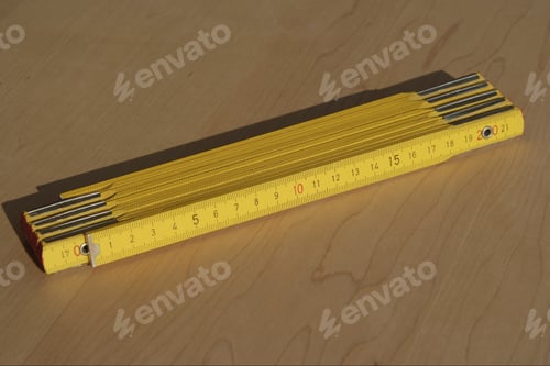 Preview: Close Up Of Folding Ruler On Table