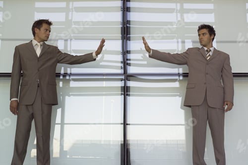 Preview: Two Businessmen Making Stop Gesture To Each Other