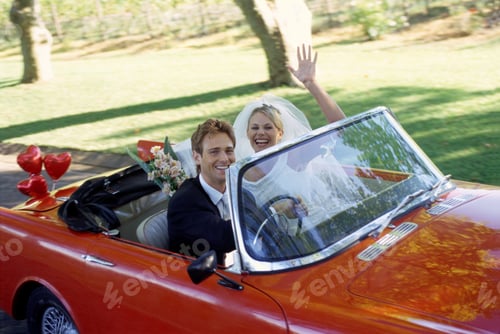 Preview: Bride And Groom Driving Away In Red Convertible, Waving