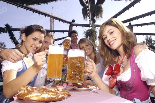 Preview: People Enjoying Beer At Festival In Munich