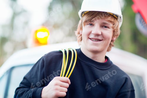 Preview: Portrait Of Teenage Electrician Student Wearing Hardhat
