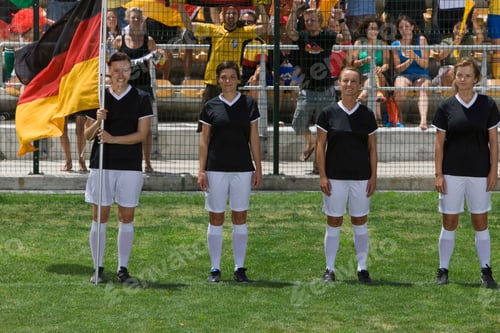 Preview: Group Of Female Soccer Players With German Flag Standing On Field