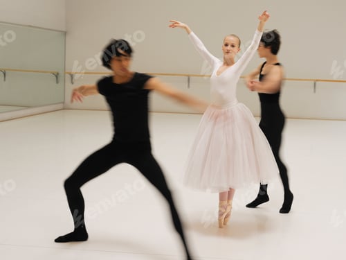 Preview: Young Ballerina And Two Male Ballet Dancers Practicing