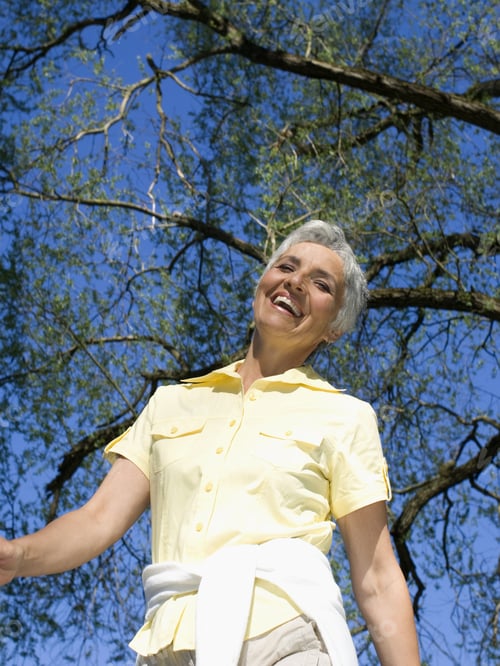 Preview: Low Angle View Of Senior Woman Walking Outdoors