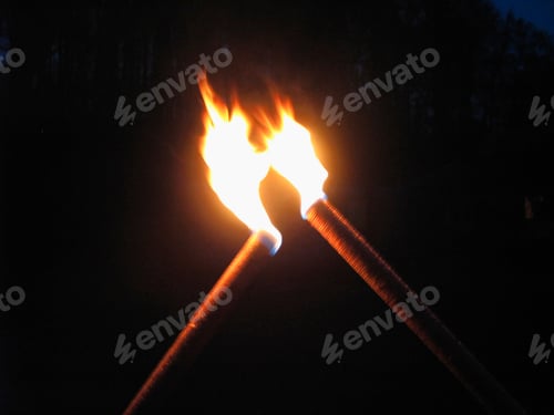 Preview: Two Flaming Torches In Dark