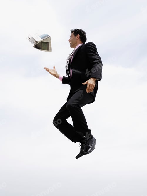 Preview: Low Angle View Of Businessman Jumping