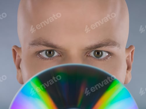 Preview: Man Holding Cd In Front Of Face