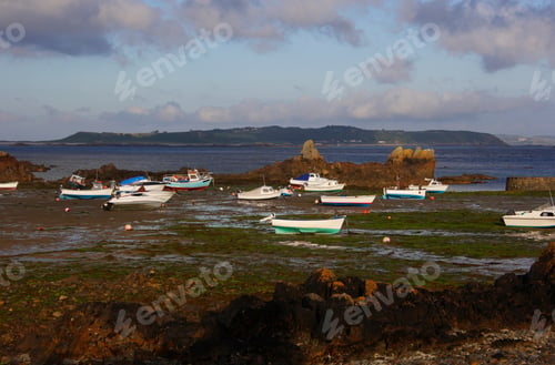 Preview: Small Fishing Boats At Low Tide, North Coast Of Guernsey, Channel Islands, Uk
