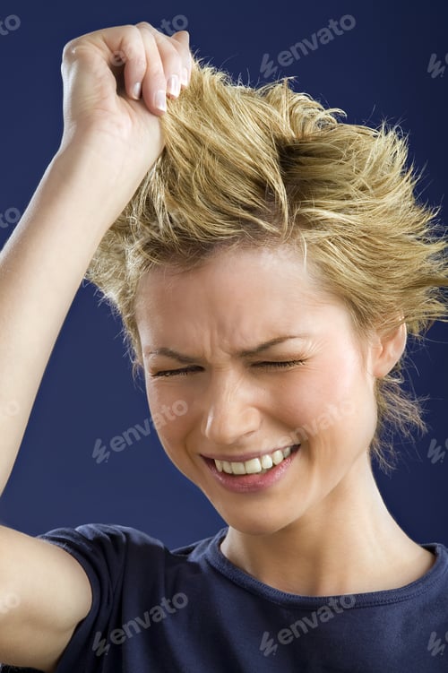 Preview: Woman Pulling Her Hair With Eyes Closed