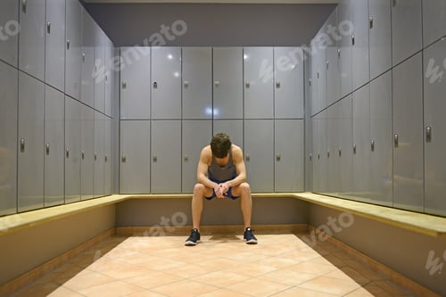 Preview: Teenage Boy In Gym Locker Room, Looking Down