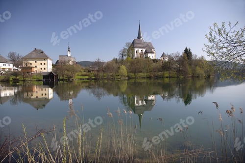 Preview: Scenic View Of Church Across Body Of Water, Carinthia, Austria