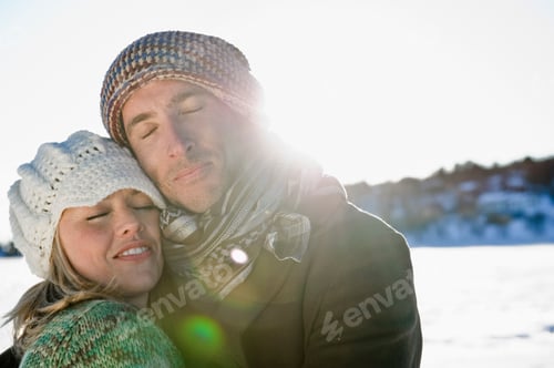 Preview: A Young Couple Embracing In The Snow