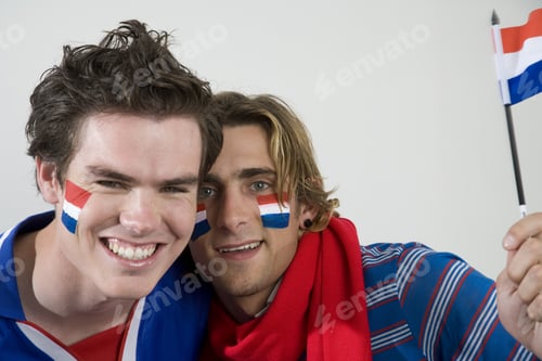 Preview: Male Sports Fans With Flags Painted On Faces