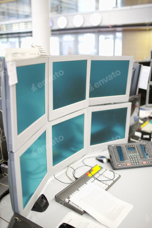 Preview: Work Station With Many Computer Monitors In Office
