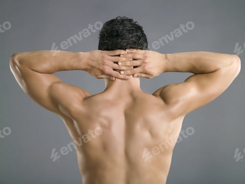 Preview: Rear View Of Man With Hands Clasped Behind Head