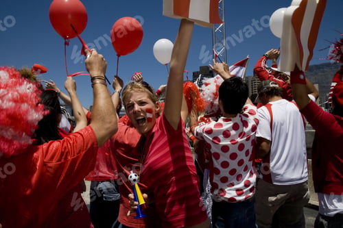 Preview: Sports Fans Cheering With Arms Raised