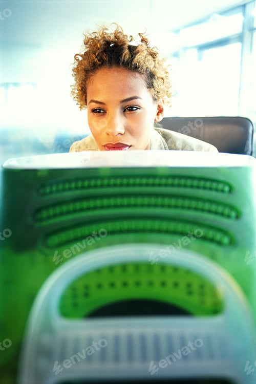 Preview: Young African-American Woman Working On Computer