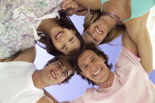Preview: Low Angle View Of Friends In Huddle