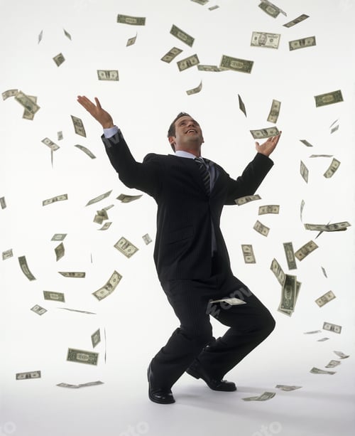 Preview: Studio Shot Of Money Falling On Businessman