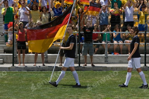 Preview: Female Soccer Player Carrying German Flag