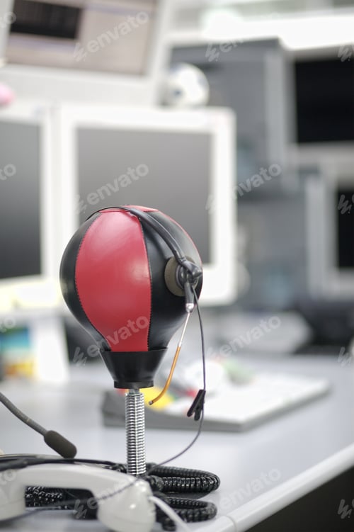 Preview: Headset On Small Punching Bag On Desk