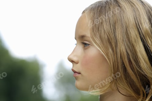 Preview: Profile View Of Young Girl Outdoors