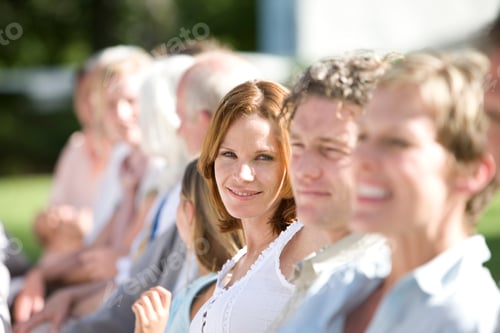 Preview: A Group Of Guests At An Outdoor Reception