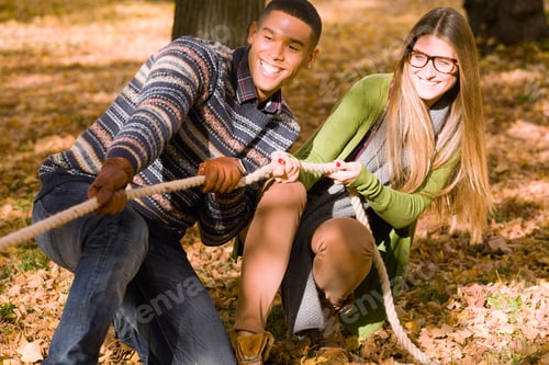 Preview: Young University Students Playing Tug Of War On College Campus