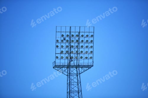 Preview: Silhouette View Of Stadium Lights Against Blue Sky