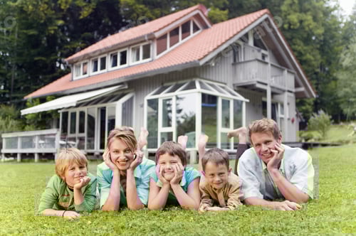 Preview: Portrait Of Young Family In Front Of House