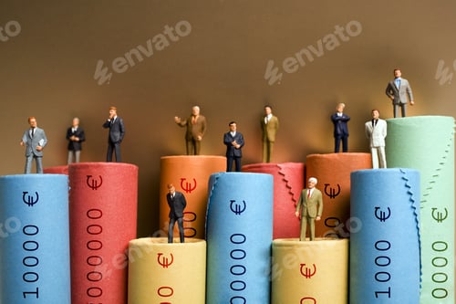 Preview: Rolls Of Assorted Euro Coins With Businessmen Figurines