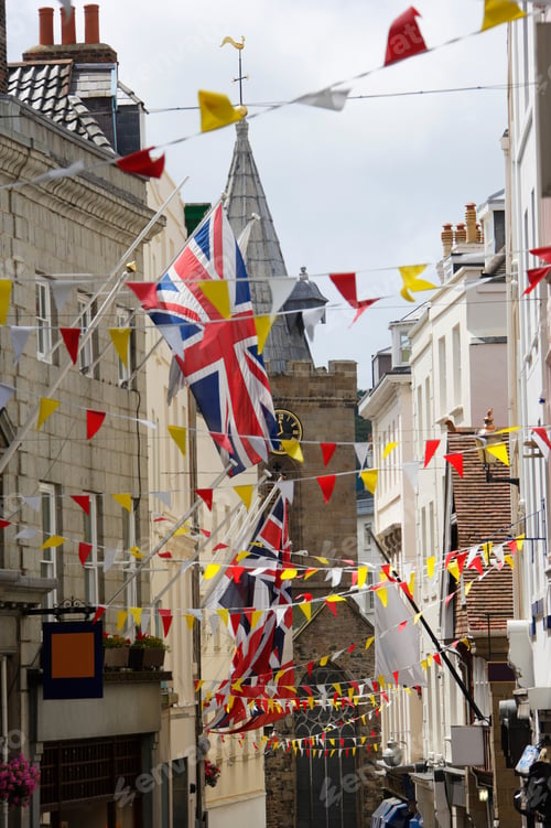 Preview: British And French Flags On High Street At St. Peter Port, Guernsey, Channel Islands, Uk