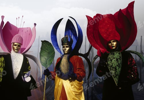 Preview: Three Costumed Carnival Participants In Venice, Italy