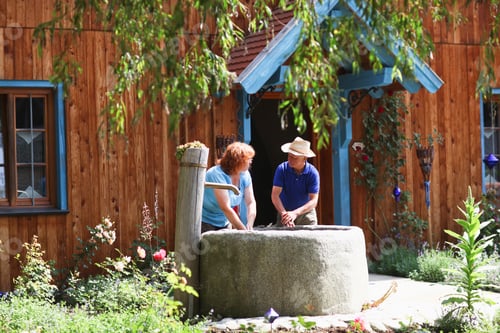 Preview: Couple Using Well On Farm